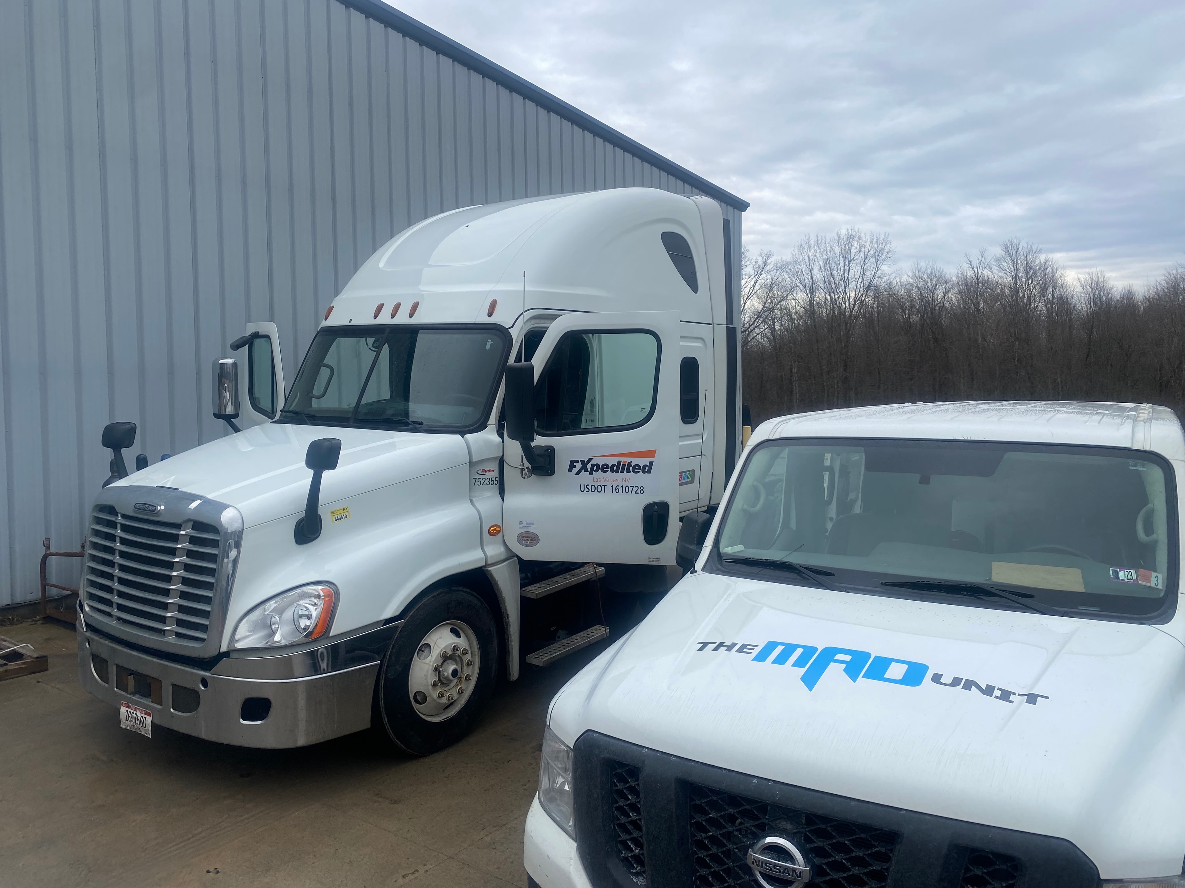 MAD Unit van alongside FXpedited commercial fleet truck