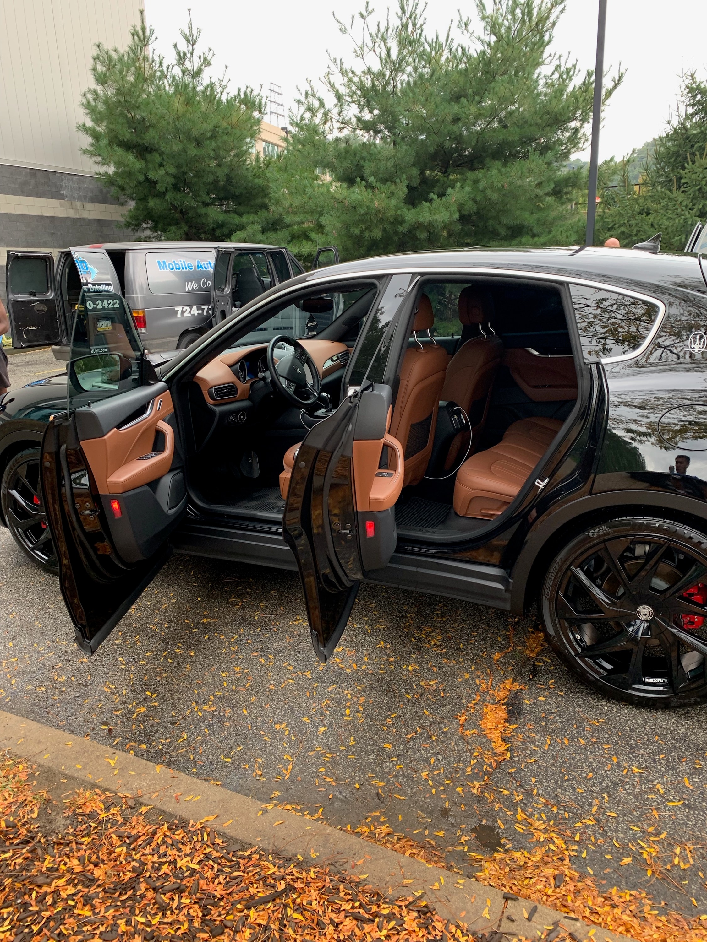 Maserati luxury interior brown leather seats doors open
