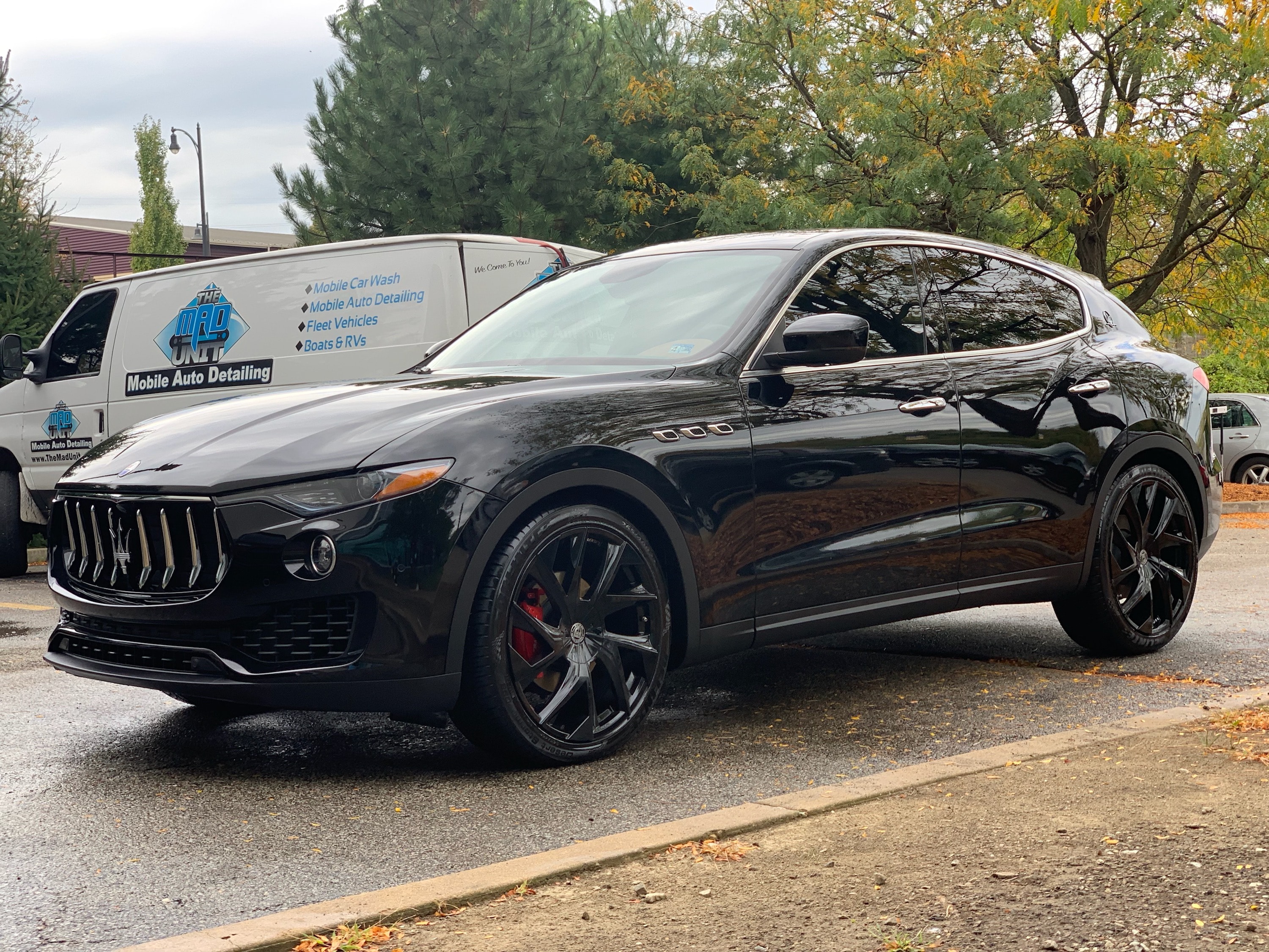Black Maserati Levante SUV with MAD Unit detailing van
